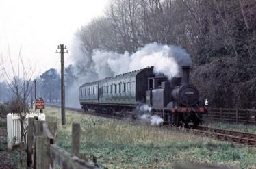 Engine Puffing Along Track